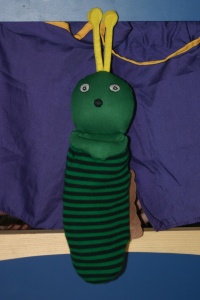 Monsieur la chenille (or Mr. Catterpillar) came to read us Eric Carle's book, The Very Hungry Catterpillar.  Kids had fun putting various foods into his tummy!